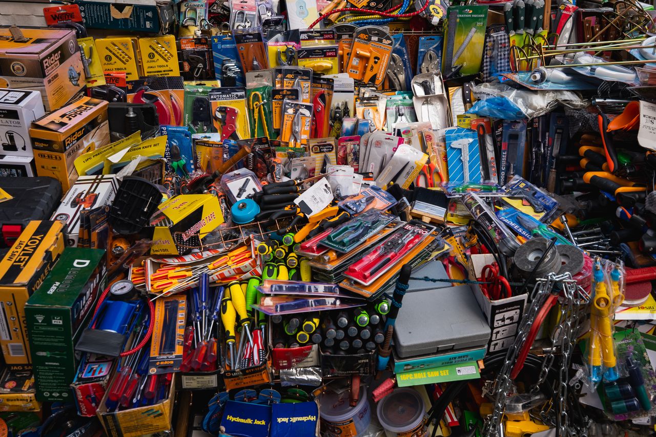 services-bg A vibrant display of various tools and hardware items at a market in Colombo, Sri Lanka.